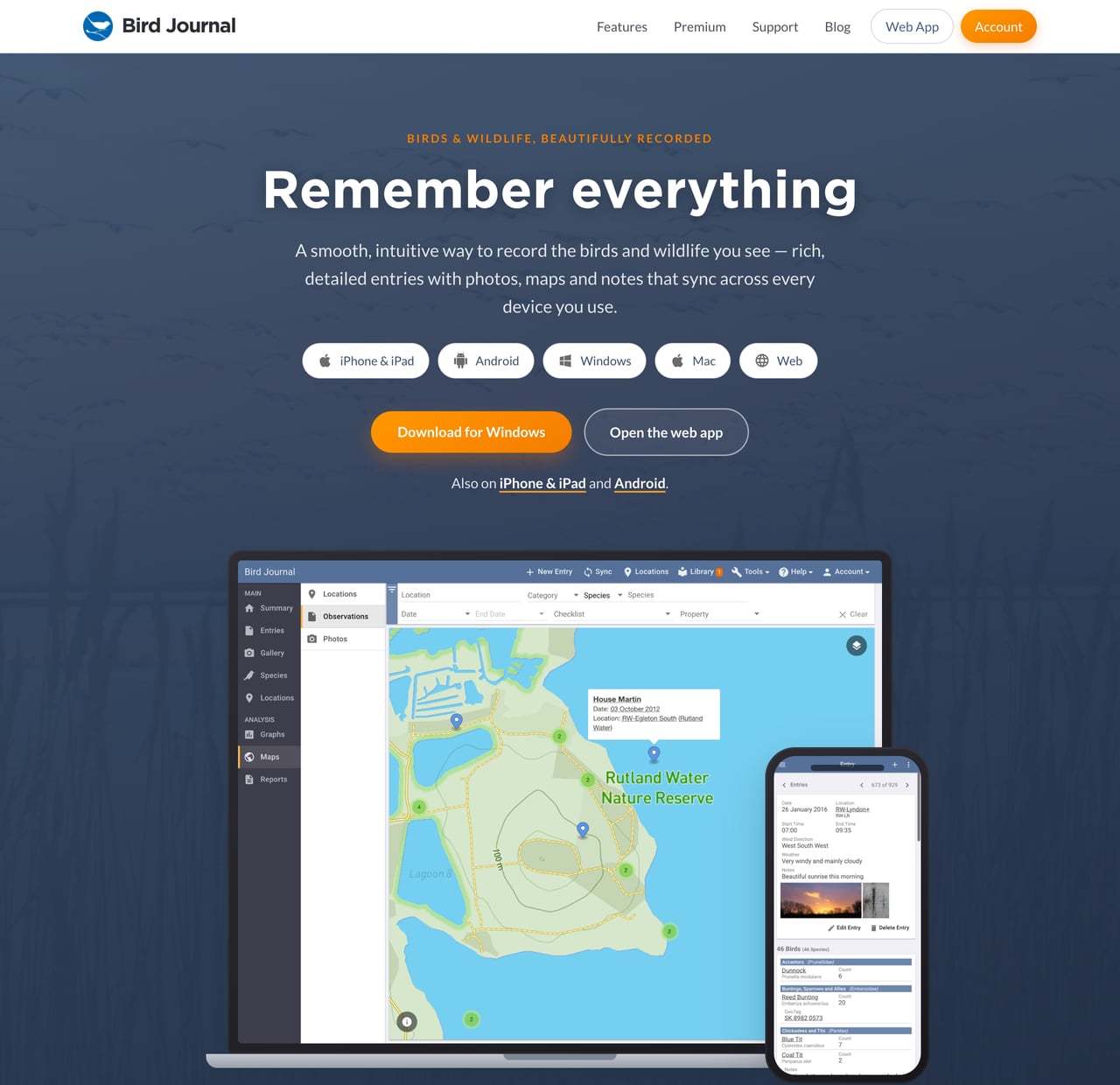 The redesigned birdjournal.com homepage, with the new slate-blue hero, platform pills and laptop and phone showing Bird Journal
